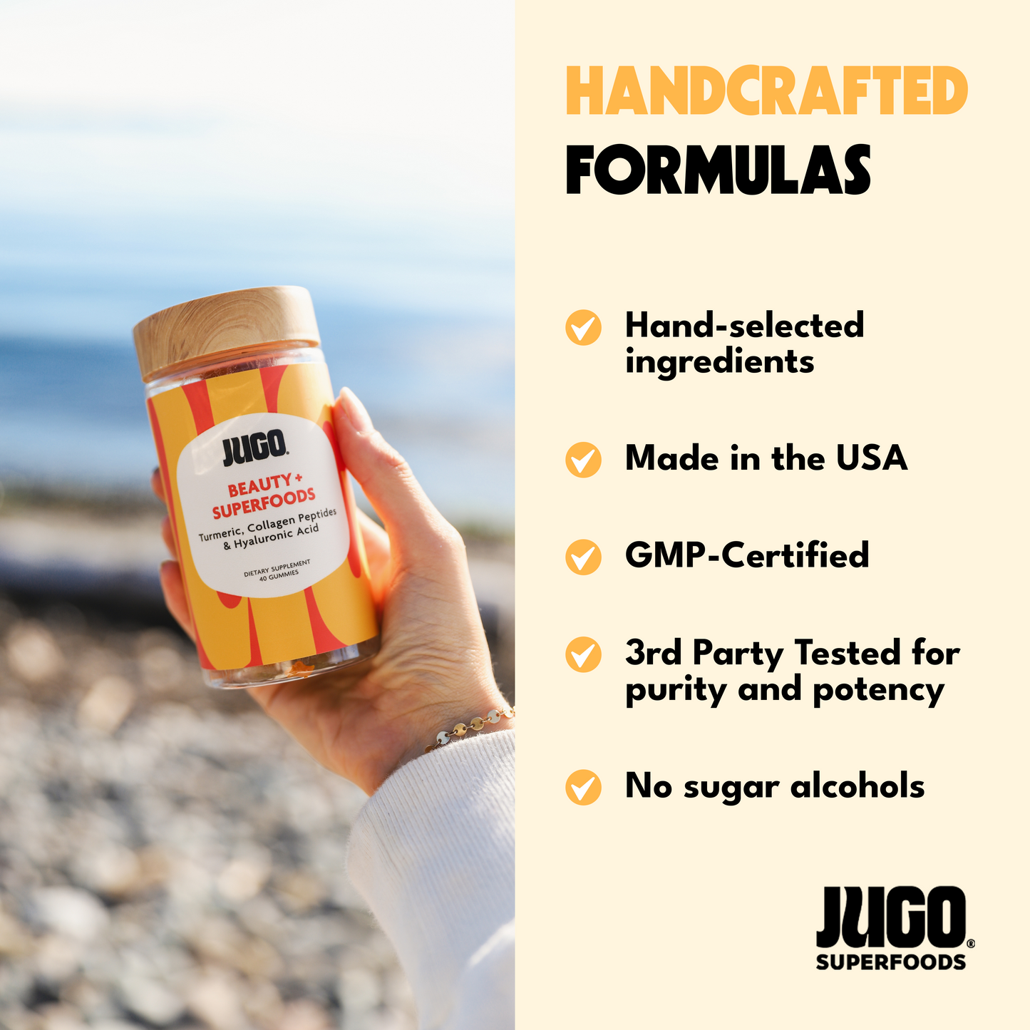 JUGO BEAUTY Hair, Skin & Nails supplement in a clear jar with a colorful label, held against a scenic outdoor background.