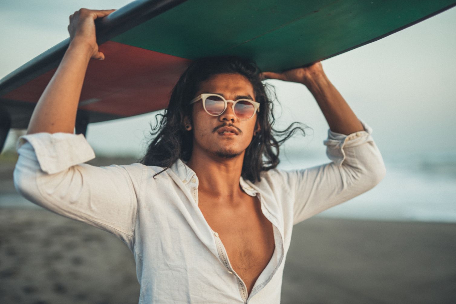 Surfer who takes JUGO FOCUS + SUPERFOODS gummies