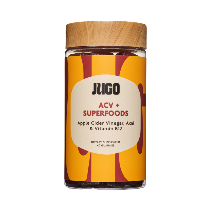 Front-facing product shot of a Jugo ACV Superfoods bottle centered on a plain light background.