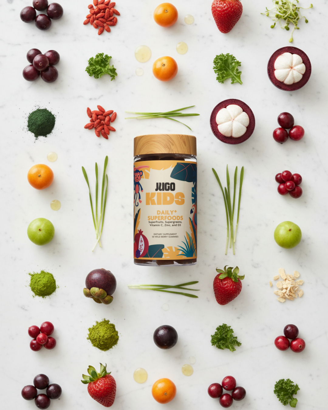 Flat-lay composition of a Jugo Kids Daily Superfoods bottle centered among colorful fruits and vegetables on a white background.