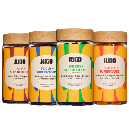 Starter bundle image showing multiple Jugo Superfoods bottles grouped together with fresh fruits behind them.